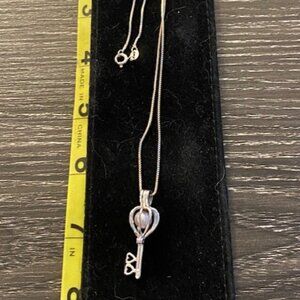 Sterling silver and pearl heart necklace